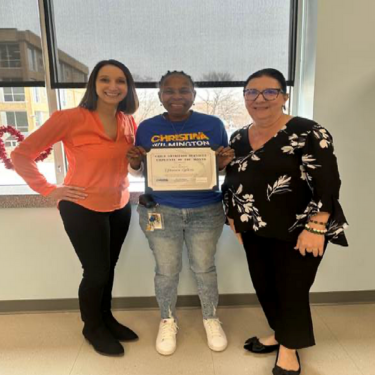  Photo of Child Nutrition Services' January Employee of the Month with Admins